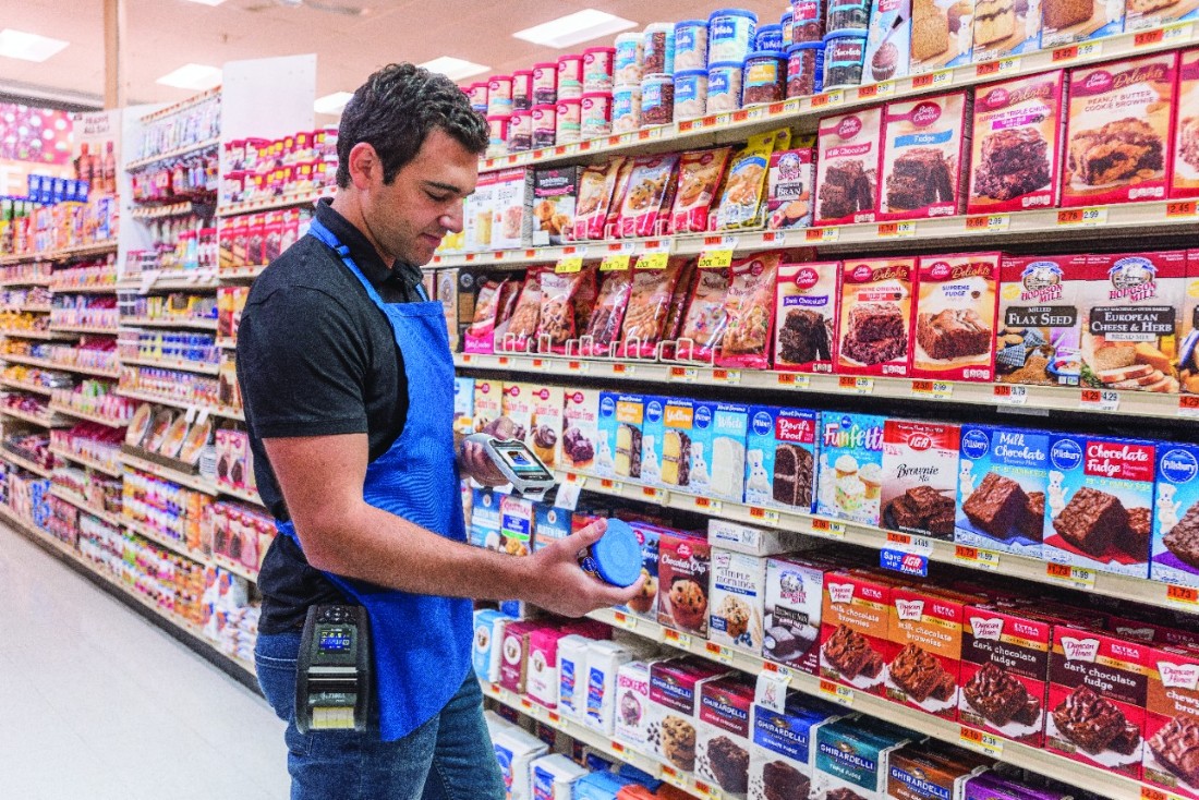 Scanner laser Zebra LS1203 en lecture sur produit.